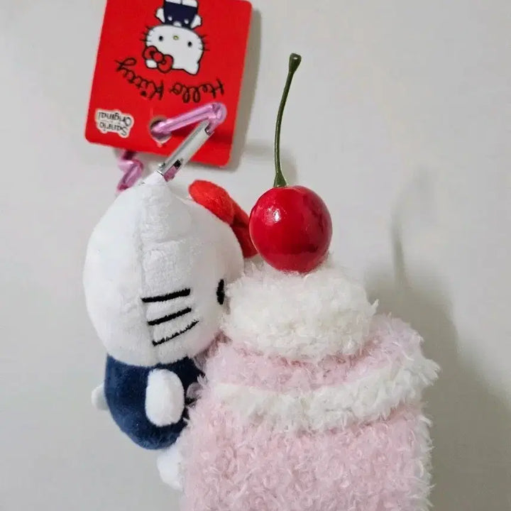 [BUNJANG] Sanrio Hello Kitty Cherry Roll Cake Keychain / 산리오 키티 체리 롤케이크 인형키링