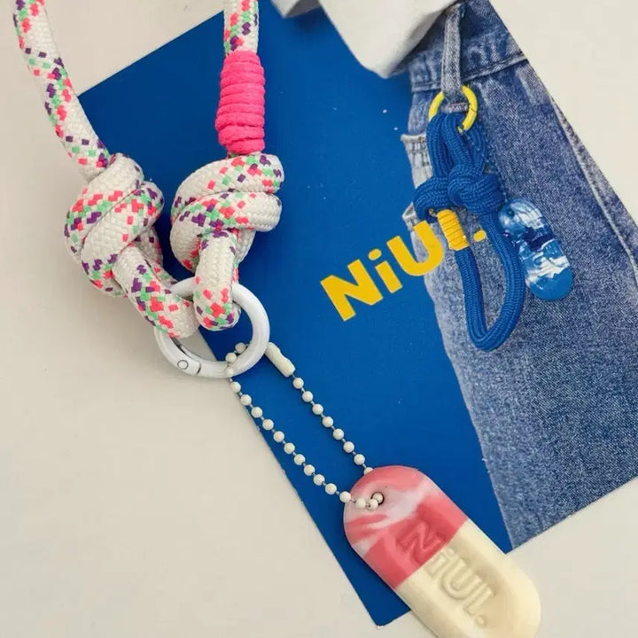 [BUNJANG] NIUL Upcycled Bottle Cap Keychain / NIUL 니울 니울링 병뚜껑 업사이클링 키링 열쇠고리