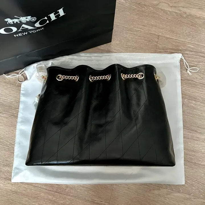[BUNJANG] Coach Evelyn Quilted Shoulder Bag / 코치 에블린 숄더 백 위드 퀼팅