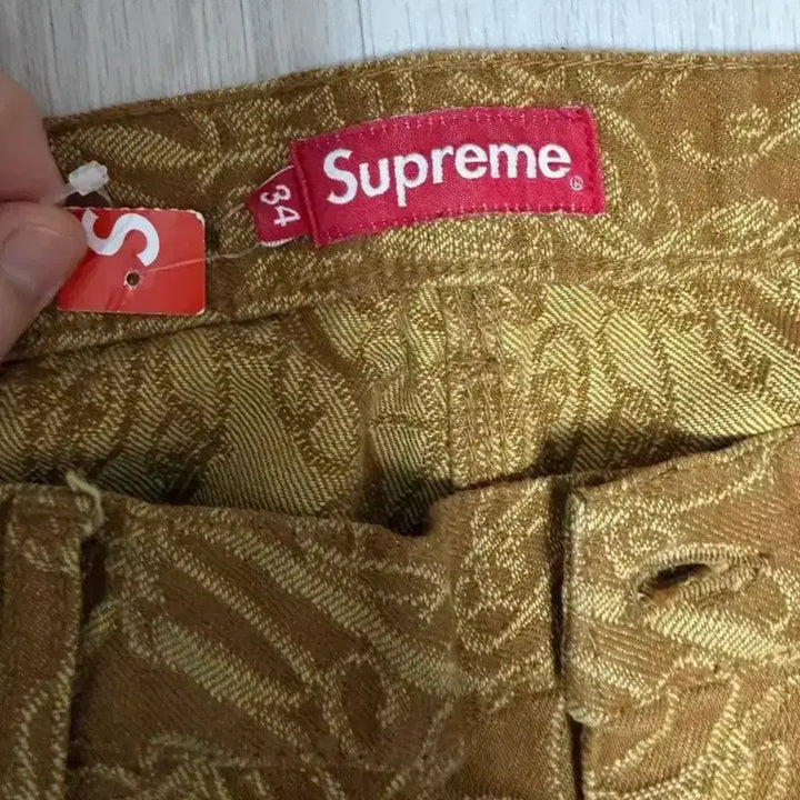 [BUNJANG] Supreme Script Jacquard Double Knee Denim Painter Pants Brown / 슈프림 스크립트 자카드 더블 니 데님 페인터 팬츠 브라운 - 22FW