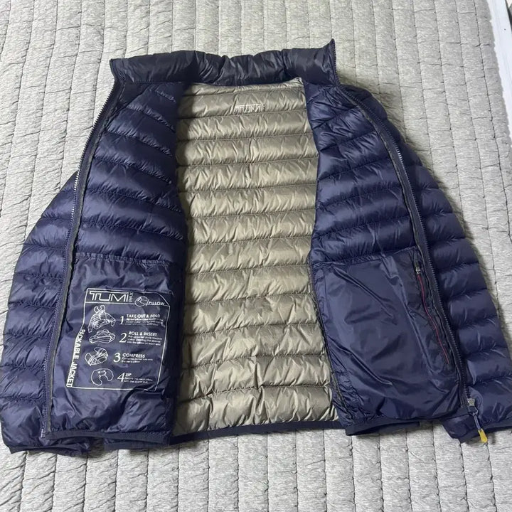 [BUNJANG] TUMI Pax Charlotte Packable Lightweight Padded Jacket / 투미 TUMI 팍스 샬롯 패커블 경량패딩
