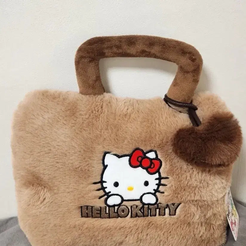 [BUNJANG] 헬로키티 퍼 브라운 물주머니 쿠션 온수 핫팩 / 헬로키티 퍼 브라운 물주머니 쿠션 온수 핫팩