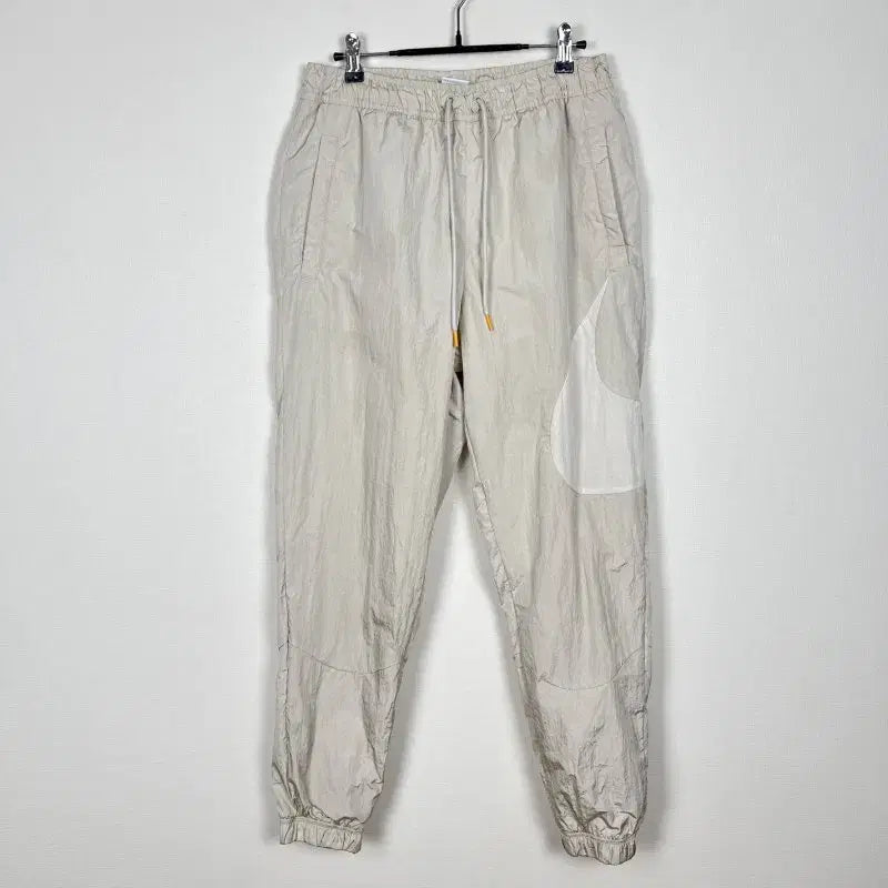 [BUNJANG] Nike Beige Windbreaker Training Pants Men&