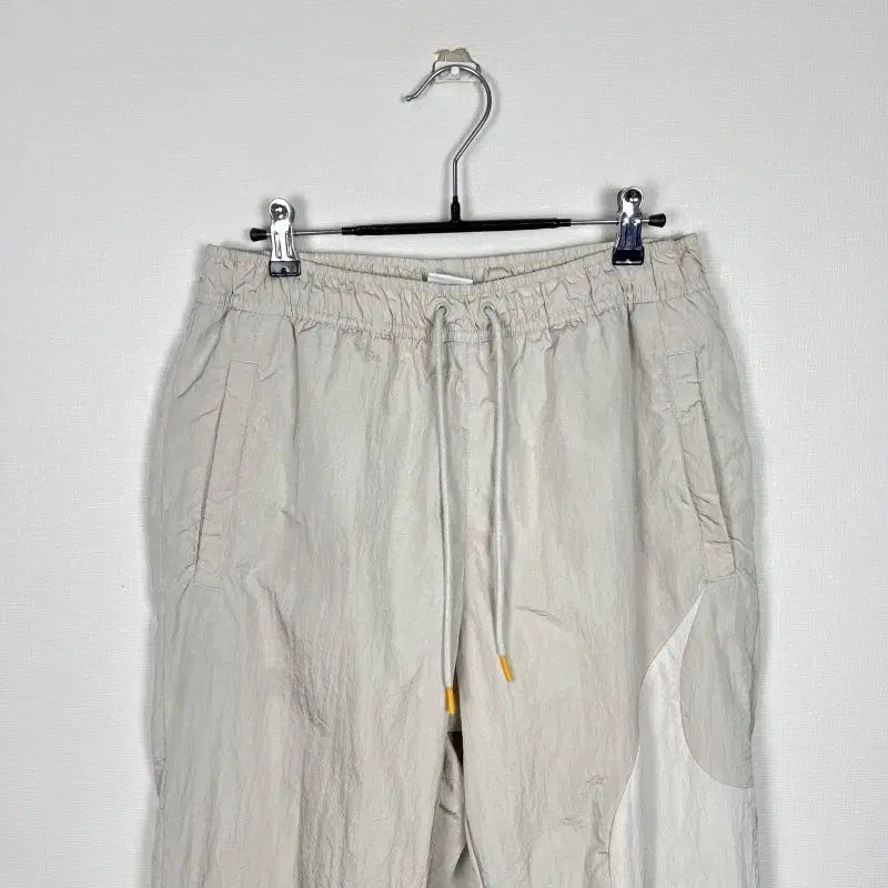 [BUNJANG] Nike Beige Windbreaker Training Pants Men&