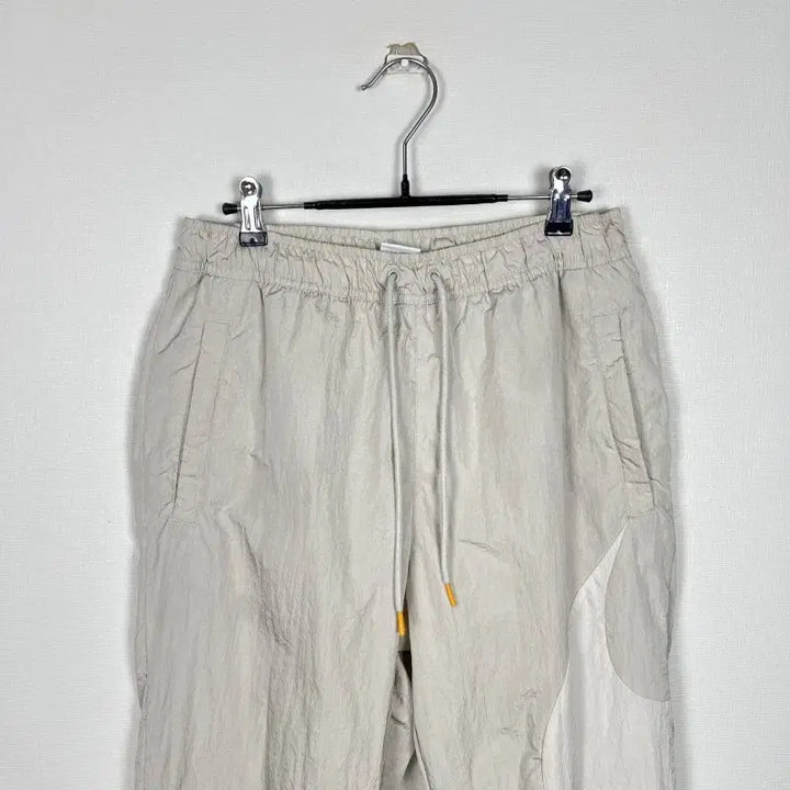[BUNJANG] Nike Beige Windbreaker Training Pants Men&