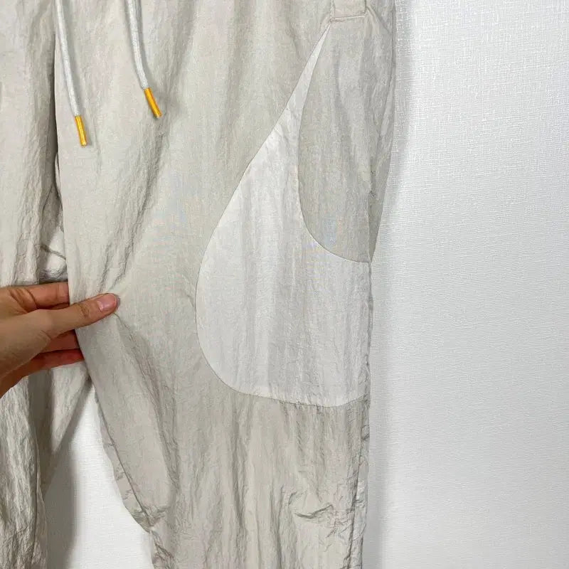 [BUNJANG] Nike Beige Windbreaker Training Pants Men&