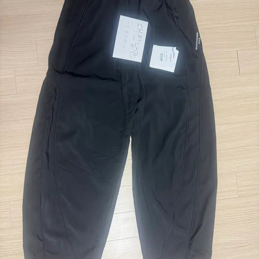 [BUNJANG] 우영미 26ss 블랙 커브드 밴딩 팬츠 38사이즈 / 우영미 26ss 블랙 커브드 밴딩 팬츠 38사이즈