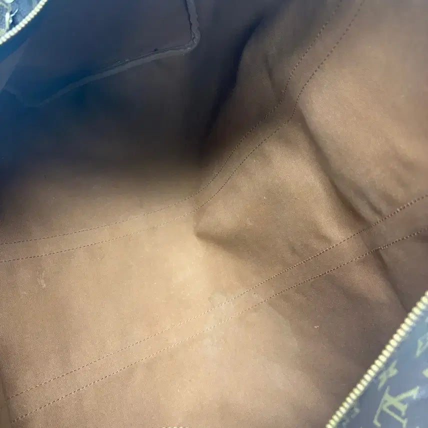 [BUNJANG] 루이비통 모노그램 키폴 반둘리에 50. / 루이비통 모노그램 키폴 반둘리에 50.