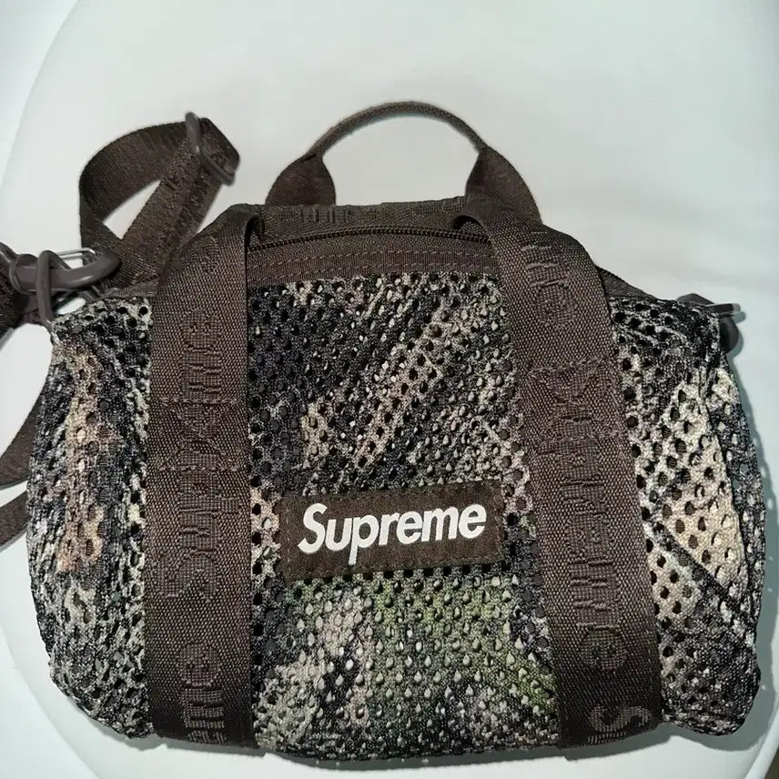 [SOLD OUT] 슈프림 카모 메쉬 숄더백 25ss