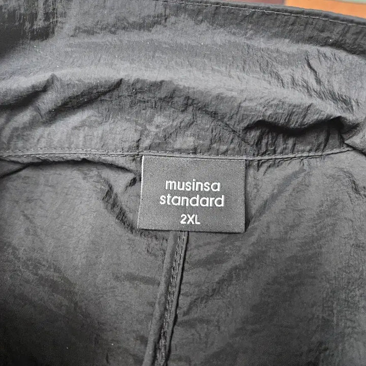 [SOLD OUT] (상태양호) 2XL 무신사 검정색 초경량 바람막이 판매합니다