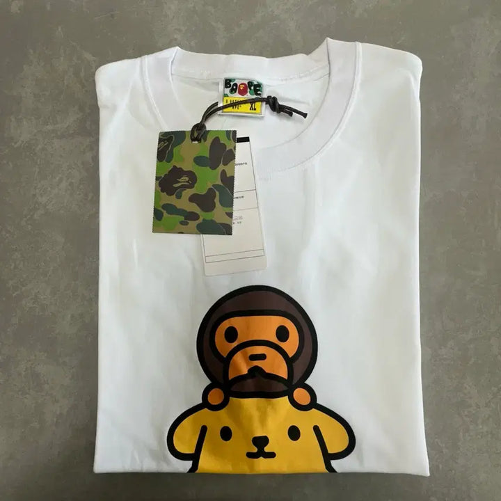 [SOLD OUT] 베이프 베이비 마일로 x 폼폼푸린 티셔츠 화이트 [XL]