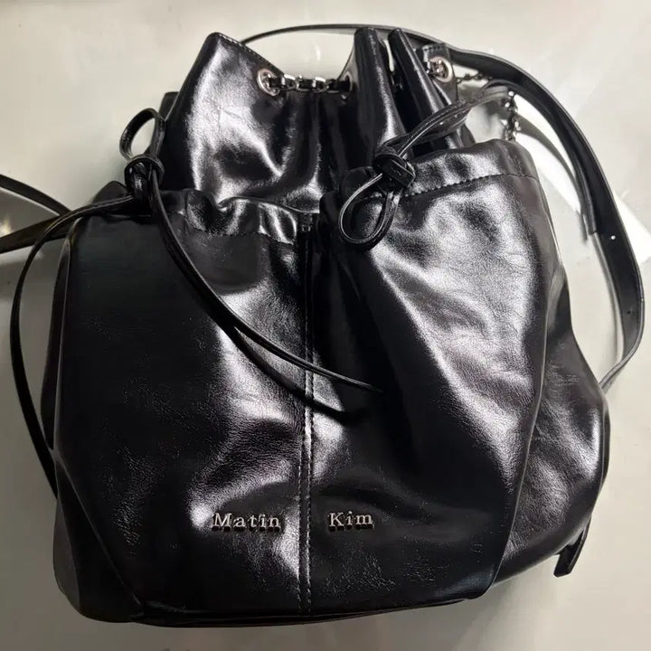 [BUNJANG] Matinkim Drawstring Ribbon Backpack Black / 마뗑킴 드로우 스트링 리본 백팩 블랙