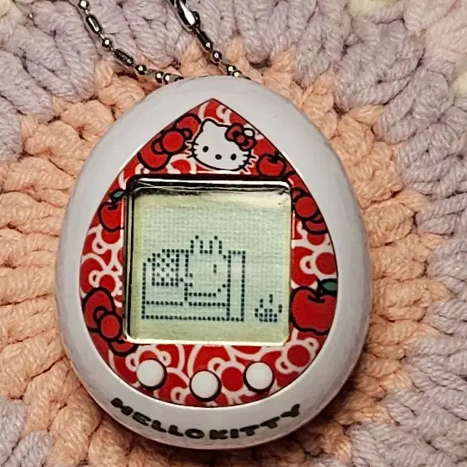 [BUNJANG] Hello Kitty Apple-Shaped Tamagotchi / 사과 키티 다마고치