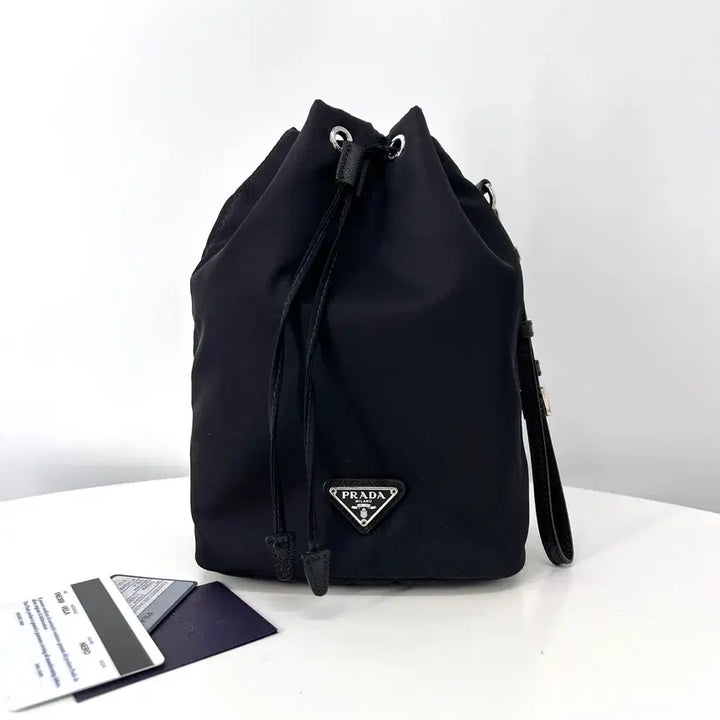 [BUNJANG] Prada Nylon Triangle Logo Bucket Pouch / 프라다 나일론 삼각로고 버킷 파우치 블랙 (1NE369)