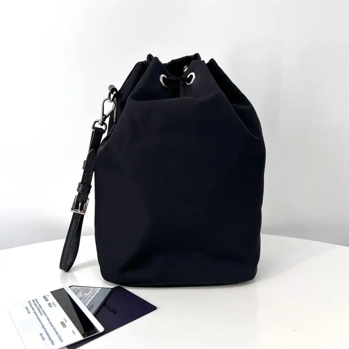 [BUNJANG] Prada Nylon Triangle Logo Bucket Pouch / 프라다 나일론 삼각로고 버킷 파우치 블랙 (1NE369)