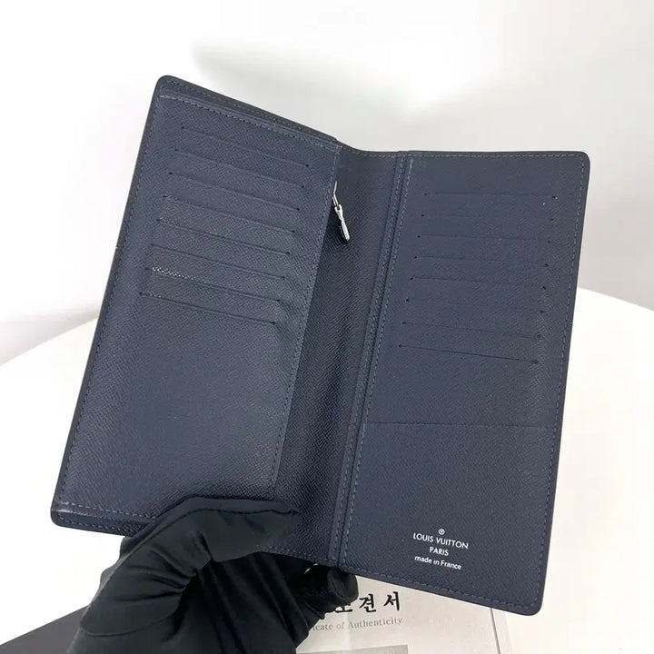 [BUNJANG] [감정완료] 루이비통 LV 로고 타이가 브라짜 장지갑 / [감정완료] 루이비통 LV 로고 타이가 브라짜 장지갑
