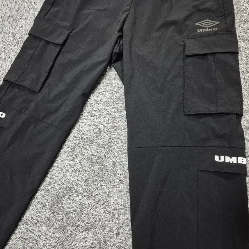 [SOLD OUT] 엄브로 여성 우븐 카고 조거팬츠 65(XS)
