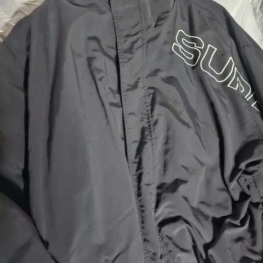[SOLD OUT] 슈프림 스펠아웃 트랙자켓 23FW 블랙 M