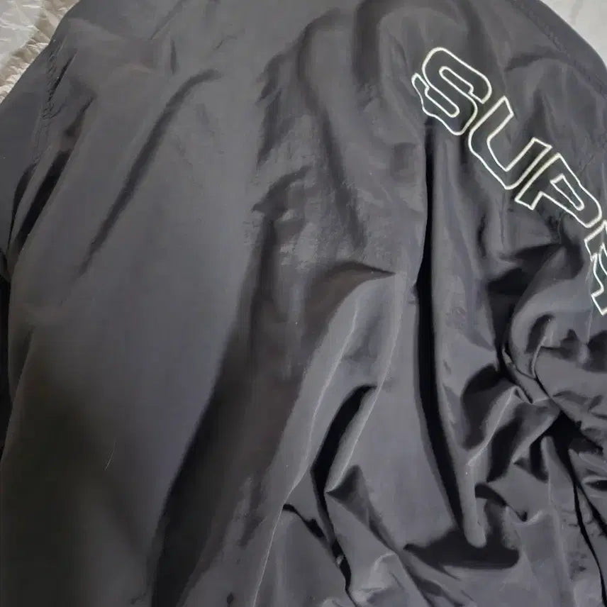 [SOLD OUT] 슈프림 스펠아웃 트랙자켓 23FW 블랙 M