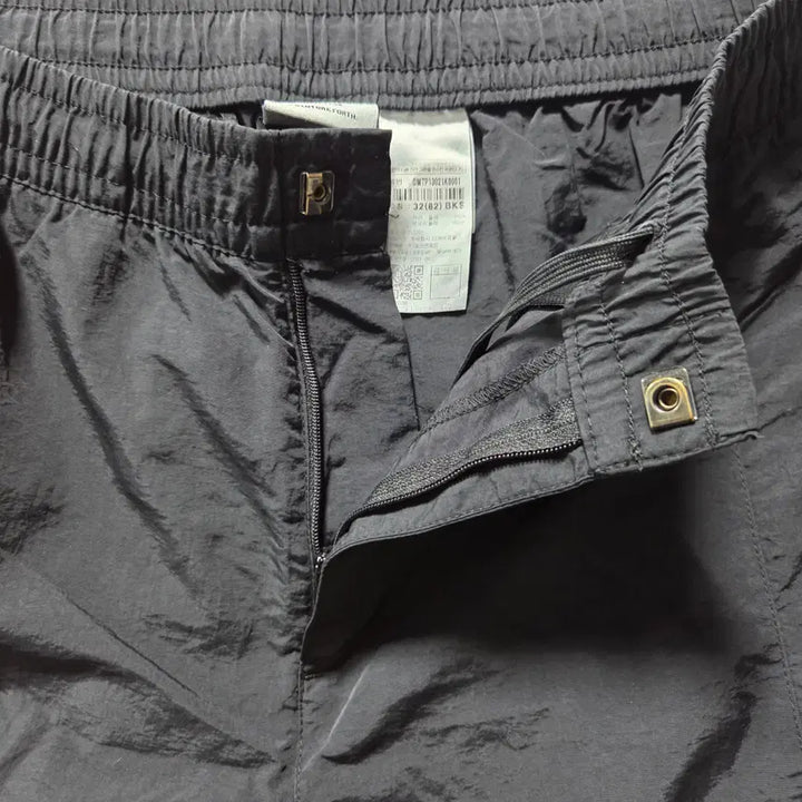 [BUNJANG] Discovery Black Woven Training Pants / 디스커버리 블랙 우븐 트레이닝 팬츠 32 26042413