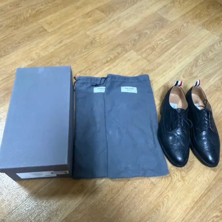 [BUNJANG] Thom Browne Classic Longwing Pebble Grain Wingtip Shoes Black / 38.5 / 톰브라운 클레식 롱윙 페블 그레인 블랙(윙팁)/38.5