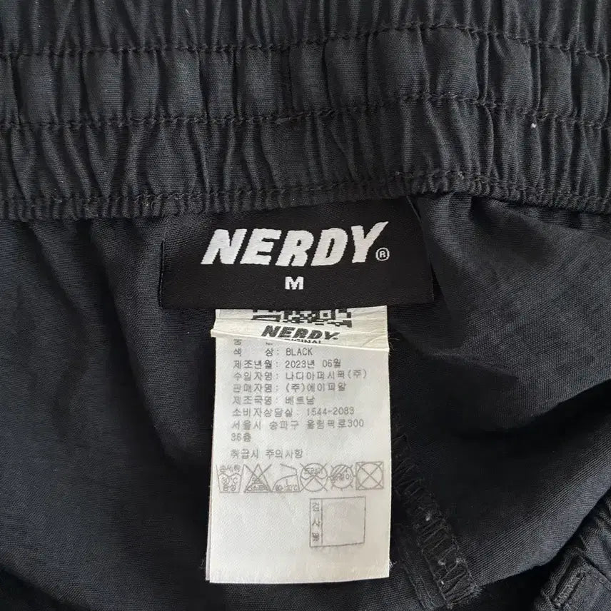 [BUNJANG] Nerdy Two-Way Nylon Cargo Pants Black / M) 널디 투웨이 나일론 카고 팬츠 블랙
