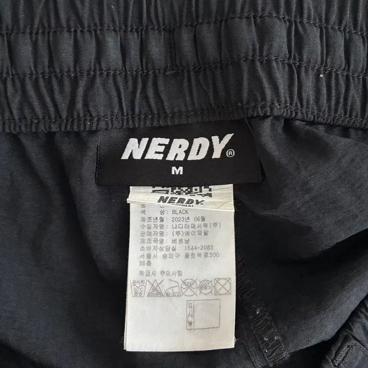 [BUNJANG] Nerdy Two-Way Nylon Cargo Pants Black / M) 널디 투웨이 나일론 카고 팬츠 블랙