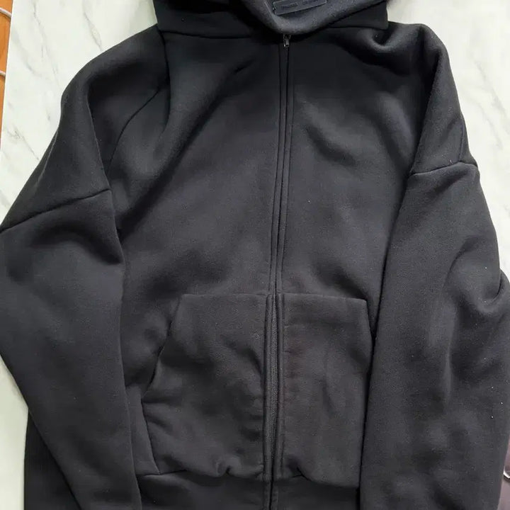[BUNJANG] Fear of God Essentials Zip-Up Hoodie Vintage Black / 피어오브갓 에센셜 후드집업 s 빈티지블랙