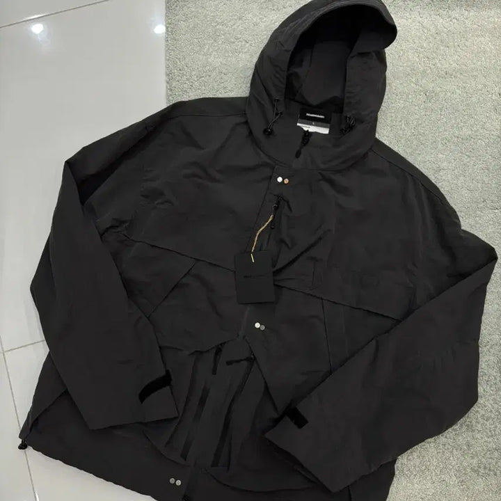 [BUNJANG] Roaringrad Utility Windbreaker Charcoal L / 로어링라드 / 유틸리티 윈드 브레이커 / L