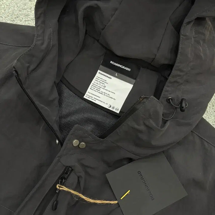 [BUNJANG] Roaringrad Utility Windbreaker Charcoal L / 로어링라드 / 유틸리티 윈드 브레이커 / L