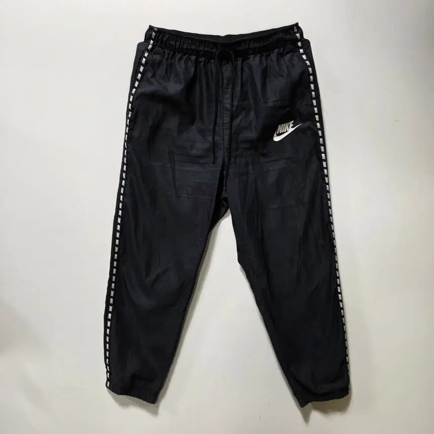 [BUNJANG] Nike Taping Logo Woven Training Pants (M) / 나이키 테이핑 로고 우븐 트레이닝 팬츠 M 26050720