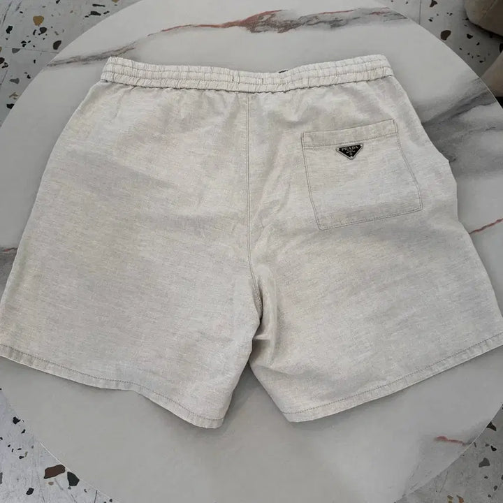 [BUNJANG] Prada New Arrival Chambray Bermuda Linen Shorts (Size L) / 신형 프라다 샴브레이 버뮤다 린넨 반바지 L