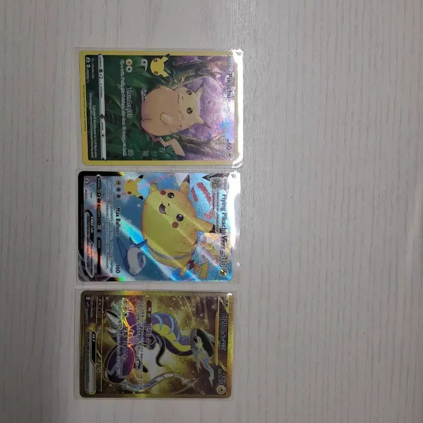 [BUNJANG] 25th Anniversary Pikachu (Chubby, Sky Attack) North American Version, Miraidon UR / 포켓몬카드 25주년 피카츄 (뚱뚱이, 공중날기) 북미판, 미라이돈 ur