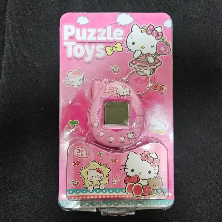 [BUNJANG] Hello Kitty Tamagotchi Game Machine Keychain / 헬로키티 다마고치 게임기 키링
