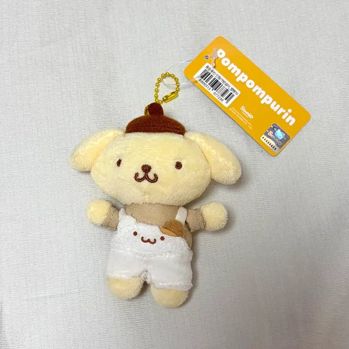 [BUNJANG] Sanrio Pompompurin Overalls Mini Keychain Plush Doll (10cm) / 산리오 폼폼푸린 멜빵 10cm 인형 미니 키링 판매