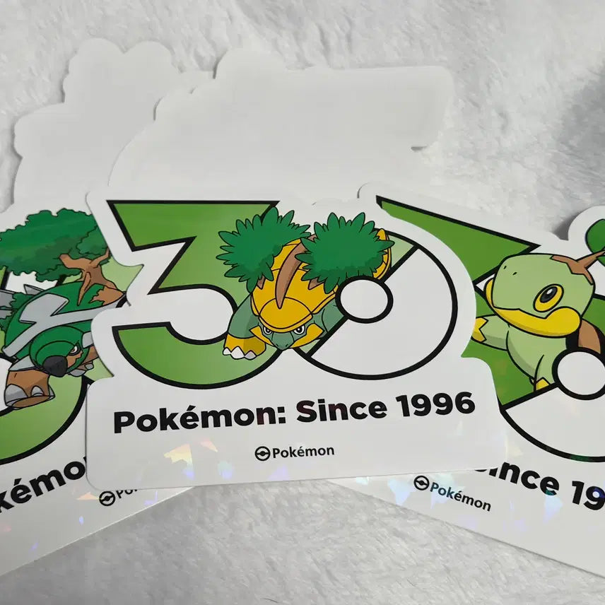 [BUNJANG] Pokemon 30th Anniversary Logo Sticker Set (Fidough, Dachsbun, Arboliva, 2 Random) / 포켓몬 30주년 로고 스티커 모부기, 수풀부기, 토대부기, 랜덤 2장