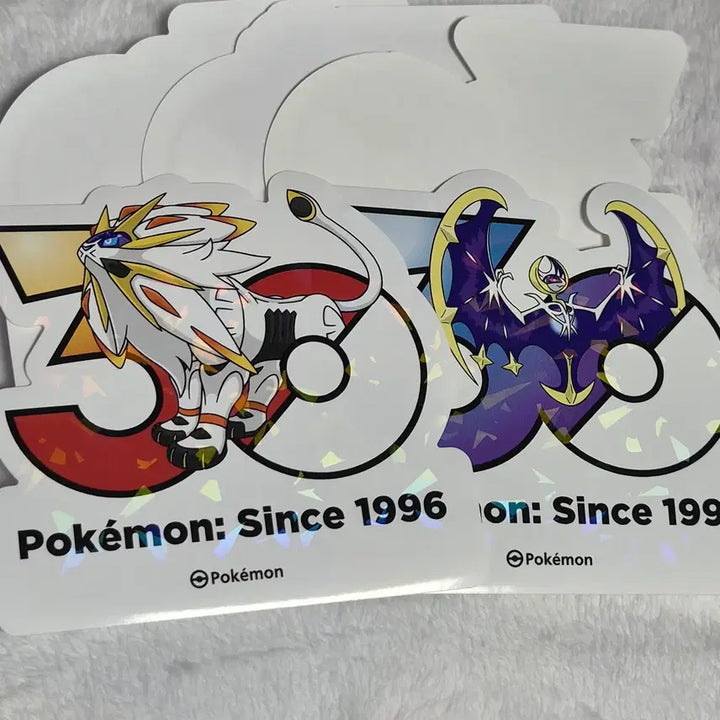 [BUNJANG] Pokemon 30th Anniversary Logo Sticker Set (Lunala, Solgaleo, 3 Random) / 포켓몬 30주년 로고 스티커 루나아라+솔가레오+랜덤3장 판매합니다.