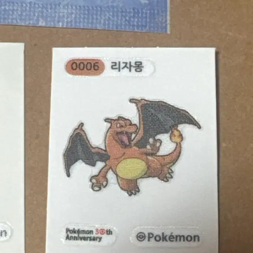 [BUNJANG] Pokemon 30th Anniversary Charizard + Pichu (Sealed) &amp; Pikachu Ukwu ji Stickers / 포케몬 30주년 리자몽+피츄(미개봉) &amp;피카츄윽우지 띠부씰