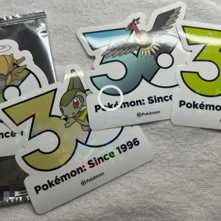 [BUNJANG] Pokemon 30th Anniversary Logo Sticker 10-Pack Bundle (Sealed + 4 Unsealed) / 포켓몬 30주년 로고 스티커 10팩 미개봉 + 개봉4장
