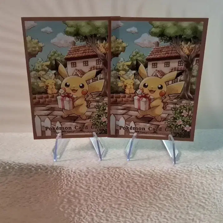 [BUNJANG] Pokemon Card "Gift Pikachu" "Illustration Sleeve" Set (2 pcs) / 포켓몬카드 "선물 피카츄" 일러스트 슬리브 실드