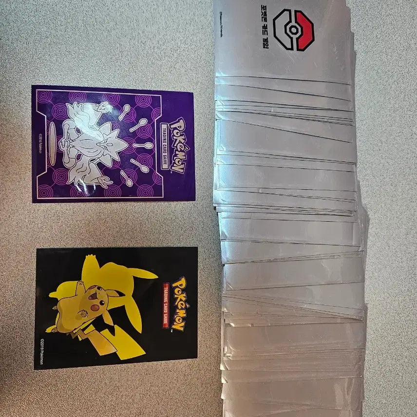 [BUNJANG] Official Pokemon Grey, 2016 Hooding, 2019 Pikachu Sleeves Bundle / [포켓몬 슬리브] 포켓몬 공식 회색 +2016 후딘슬리브+2019피카츄슬리브 판매
