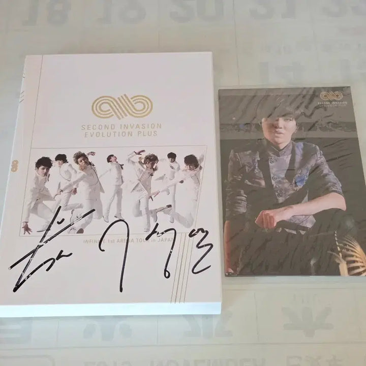 [BUNJANG] Infinite Second Invasion Evolution Plus Japan Concert DVD Signed by Nam Woohyun &amp; Lee Sungyeol / 초희귀) 인피니트 세컨드 인베이젼 에볼루션 플러스 재팬 남우현 이성열 친필싸인 일본 콘서트 디비디 DVD 앨범 양도 판매