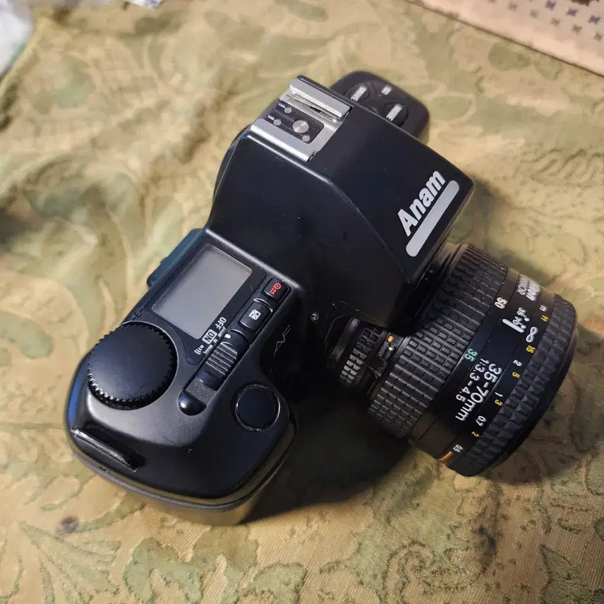 [BUNJANG] Anam Nikon F-801s Film Camera with AF Nikkor 35-70mm F3.3-4.5 Lens (1991) / 1991년에 출시된 아남 니콘 F-801s(Anam Nikon F-801s) 필름 카메라와 AF Nikkor 35-70mm F3.3-4.5 렌즈 건전지 뚜껑 없어요 카메라 대해서