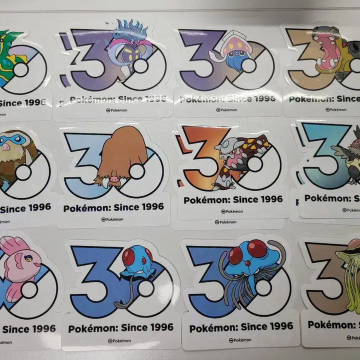 [BUNJANG] Pokemon 30th Anniversary Logo Stickers Set / (원가판매/교환) 포켓몬 30주년 로고 스티커 누니머기 브이젤 차데스 나목령 지가르데 캐터피 알로라 모래두지 로토무 타만타 찌르꼬 푸크린 유크시 설운 캐스퐁 꼬지지 레오꼬 레지락