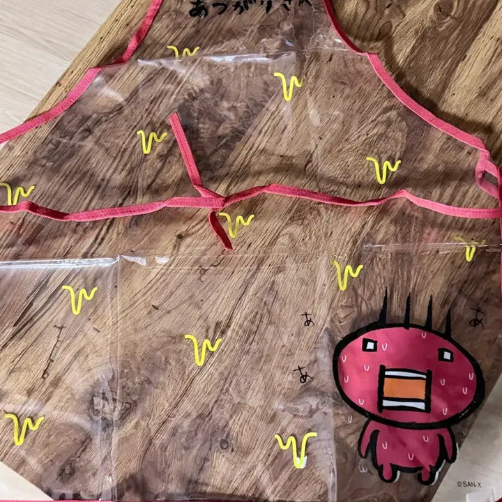 [BUNJANG] San-X Atsugari-san Clear Apron (Red) / 고전 San-X 산엑스 아츠가리상 투명앞치마 (빨강)